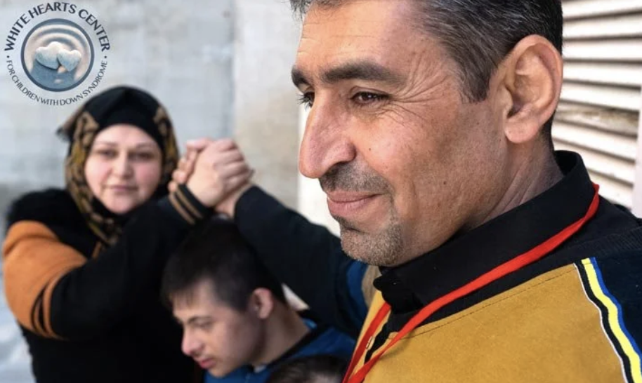 Abdullah and Bara’a Mohammed, and White Hearts Center child.